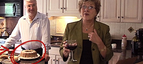 Cookie and Jim Pappas in their kitchen with Cookie's "favorite cake to make, not favorite cake to eat."