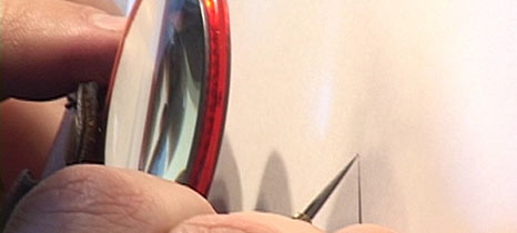 Just one of thousands of tiny marks being on the paper.